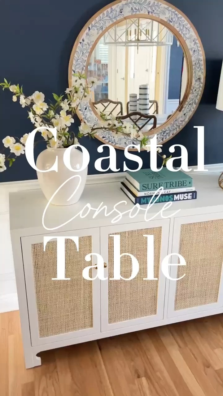 This white console table with cane details, brass handles and fluted feet adds the perfect touch of coastal charm to your space! 
11/8

#LTKStyleTip #LTKHome #LTKVideo