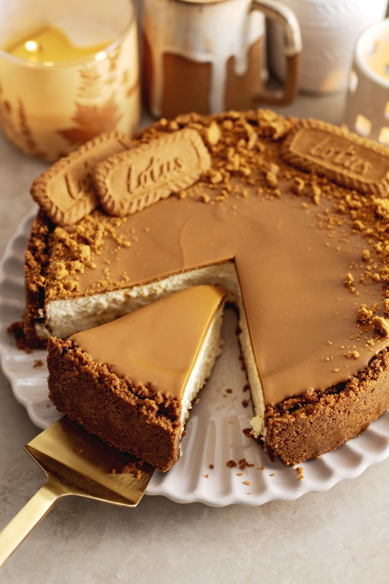 This Biscoff cheesecake is made with a Biscoff cookie crust, a creamy spiced cheesecake filling, and a layer of Biscoff spread on top. It’s the ultimate dessert for the holidays. #HolidayDessert #HolidayFood


#LTKGiftGuide #LTKHoliday

#LTKHome