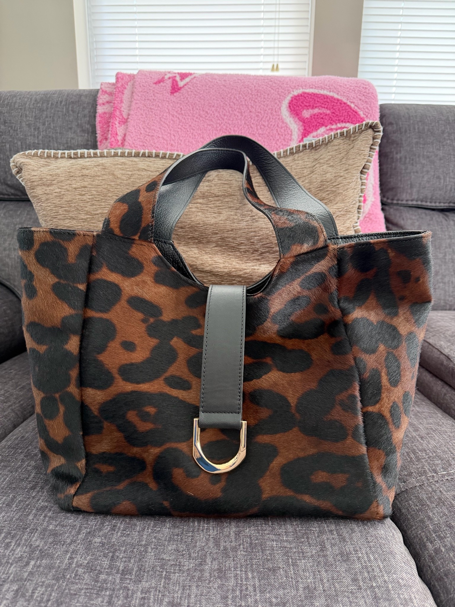 The most beautiful fall bag. 🐆🤎 The rich leopard print, leather detailing, and gold hardware make this feel so luxe. It’s made in Italy, roomy enough for everyday, and such an easy statement piece with denim, black, camel, or chocolate brown.

And it’s currently $99.99 compared to $170 such a good fall handbag find.

#LTKootd #LTKSeasonal #LTKSaleAlert
