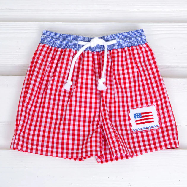 Red Gingham Flag Smocked Swim Trunks | Classic Whimsy
