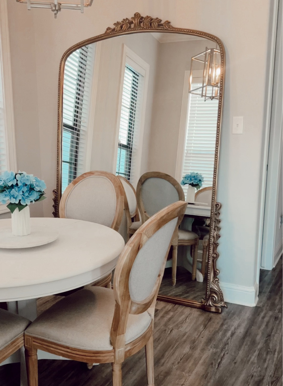 Anthropologie mirror- Gleaming primrose mirror!!!! Amazon French Louis Round back dining chairs & white round dining room table 

#LTKSale #LTKhome #LTKstyletip