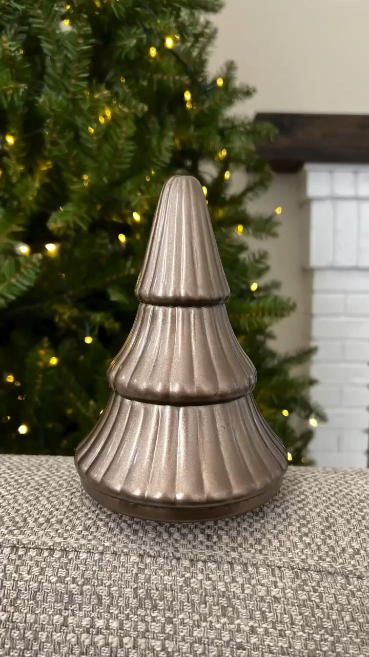 Not digging the color anymore? Grab your spray paint and get to work! How beautiful is this color from Michaels! 

Spray paint, Christmas decor, diy tree, bronze tree, tabletop tree, Christmas 

#LTKVideo #LTKHoliday #LTKhome
