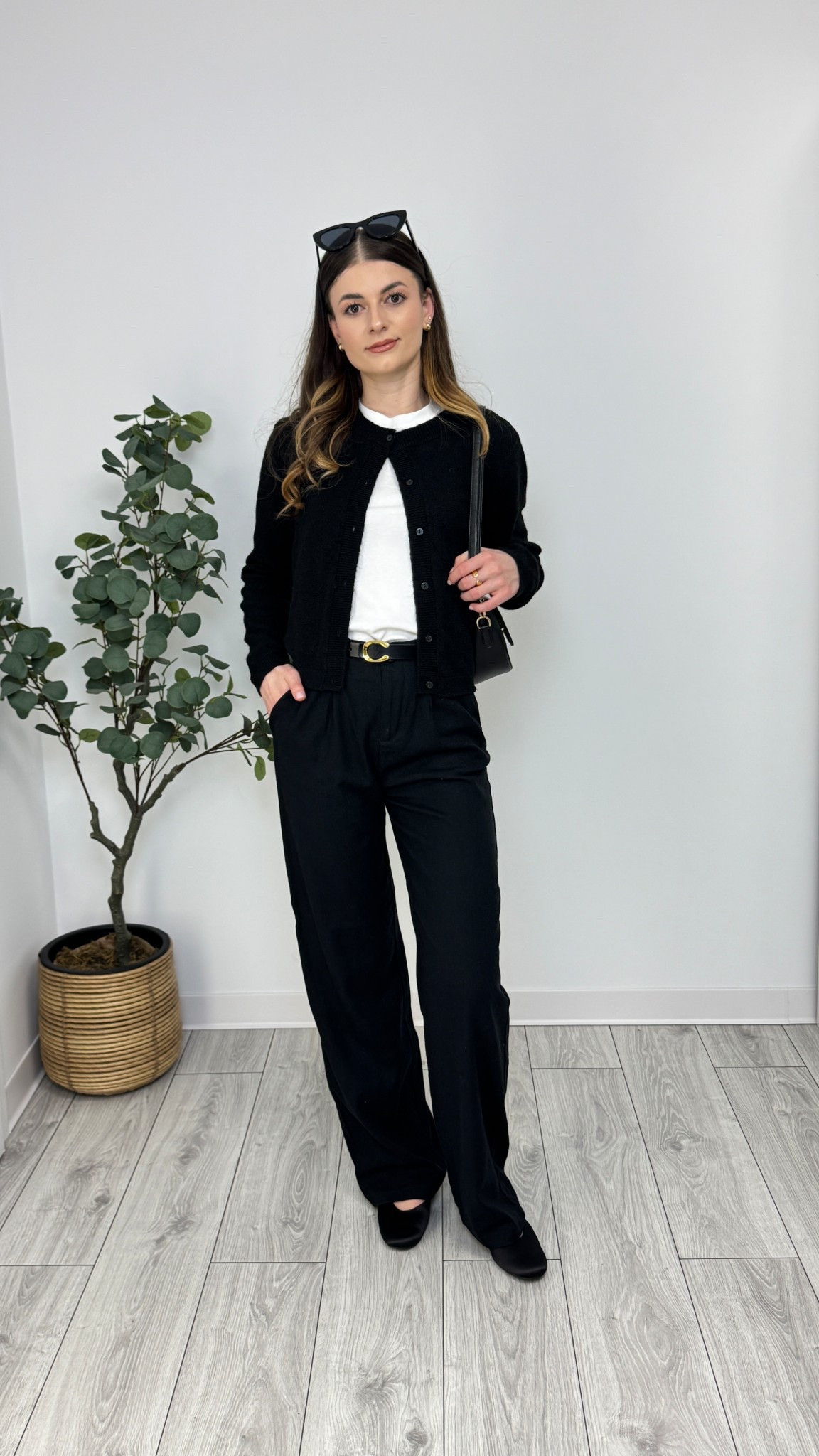 Black wide-leg trousers, white T-shirt, black cardigan, black ballerina flats, black purse, black belt, sunglasses. A perfect blend of elegance and simplicity in classic monochrome 🖤#IlaStylesDiary 

#LTKeurope #LTKspring #LTKworkwear
