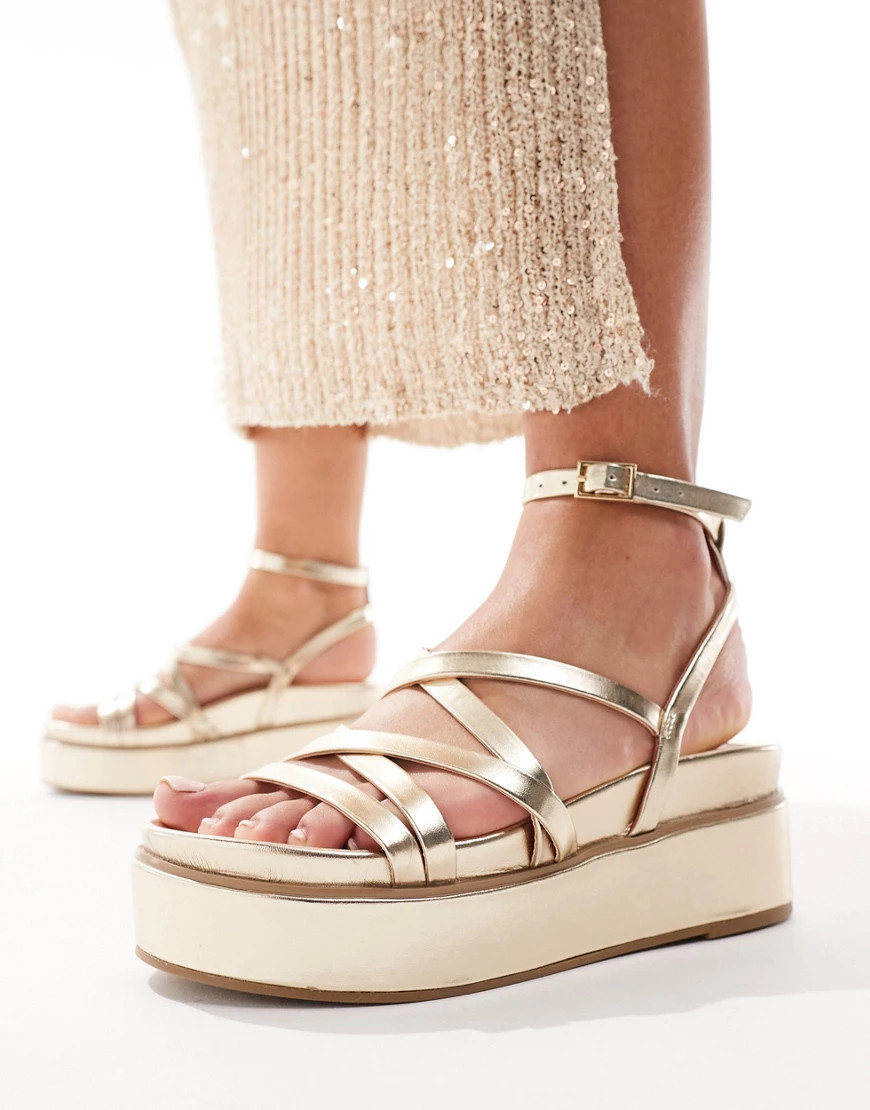 ASOS DESIGN Taurus 2 strappy flatform sandals in gold | ASOS (Global)