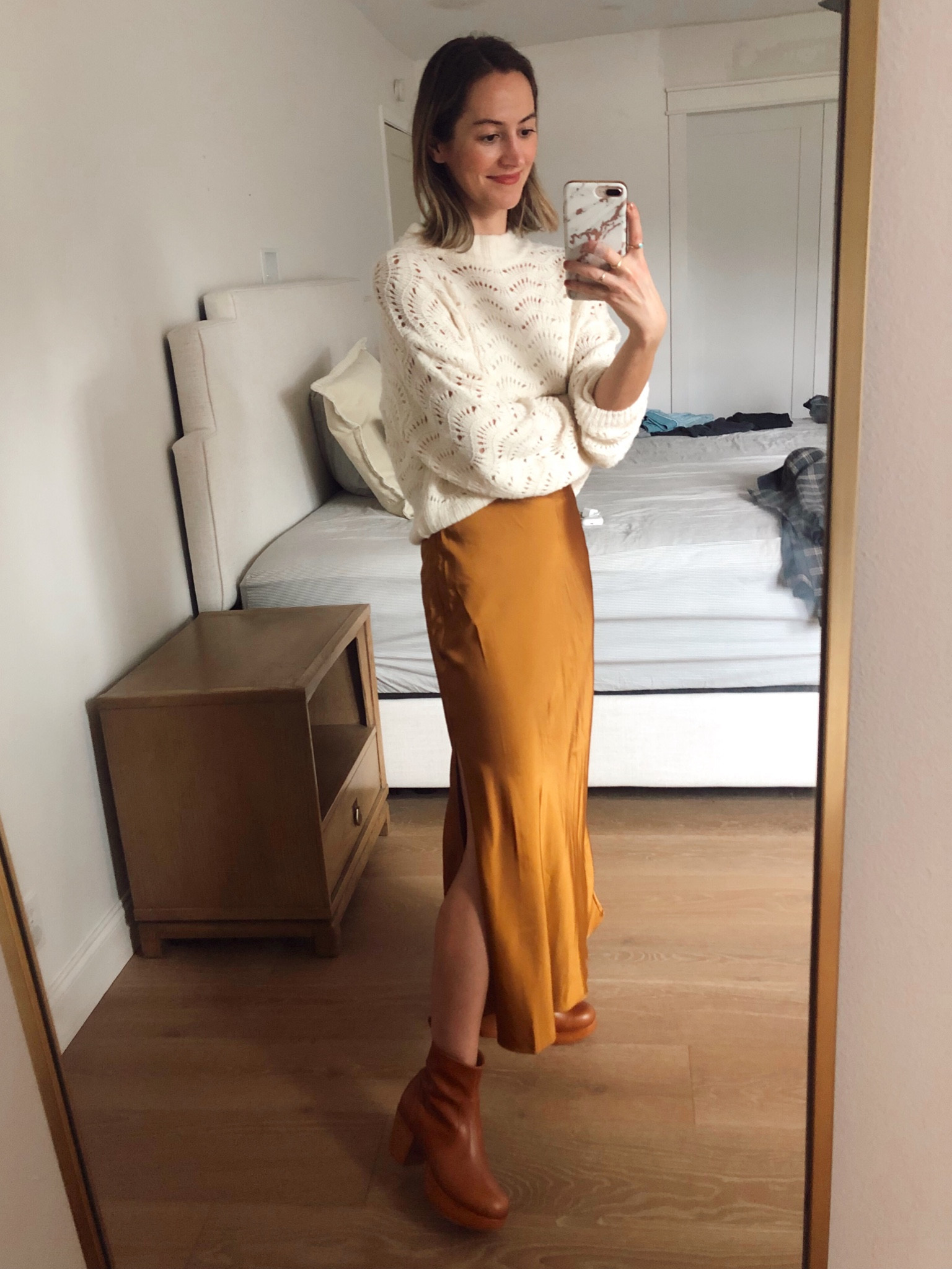 Skirt is 25% off with the LTKxAF event (receive the discount when you shop through the LTK app) and it’s a BEAUTY! Comes in black and cream, too. Wearing XS. Sweater is old so I linked a handful of similar pointelle sweater options.✨

#LTKxAF #LTKunder100 #LTKHoliday