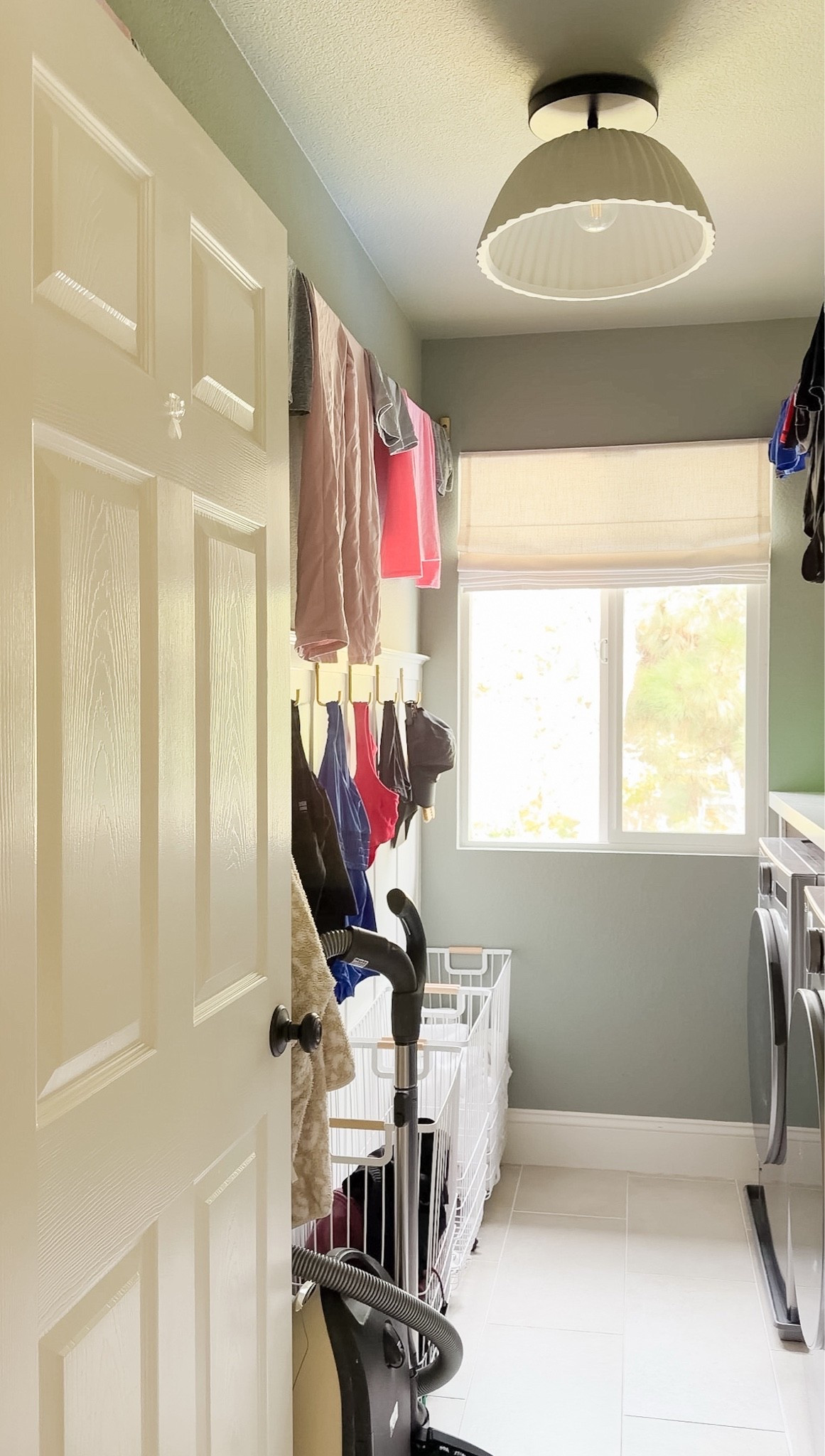 Not a picture-perfect laundry room, but definitely an optimized one!

Retractable clothesline
Laundry room baskets
Wall hooks

#LTKmomlife #LTKHome #LTKKids