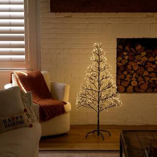 4ft. Pre-Lit Artificial Halloween Black Starburst Twig Tree with 800-Fairy Warm White LED Lights | The Home Depot