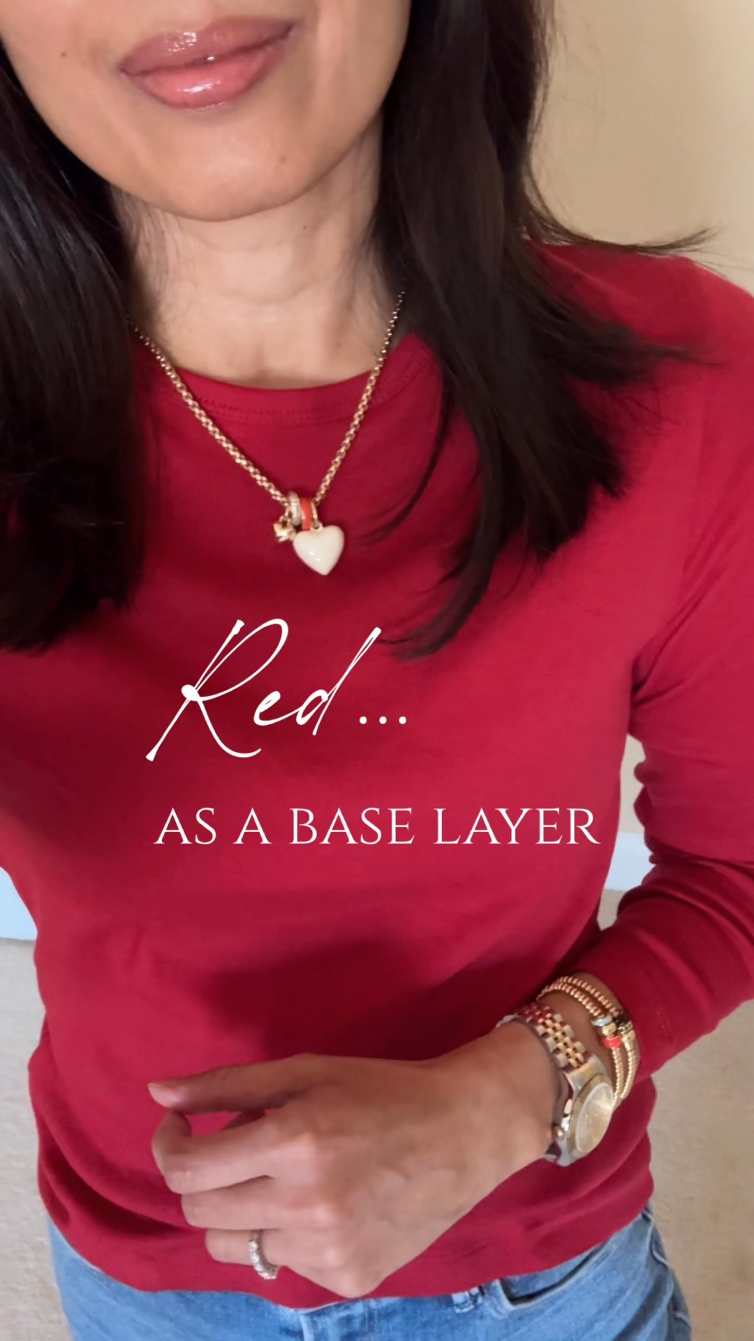Red as a base layer. 
-A white tee under a sweater with jeans has been my go-to outfit formula for winter. It never fails, but changing up the color of your base layer makes the look feel new. 
I love using red; it adds a pop to my neutral closet staples. 
I will also try with pink. 
If color isn’t your thing, then changing out your white base to even a gray t-shirt underneath helps things feel fresh. 

Exact red long sleeve t-shirt: I sized up. 
Linking other options. 

-I love these ballet sneakers. A splurge, but cost per wear on sale drew me in. The ribbon laces are everything. 
Linking options for trending ballet sneakers. 
And if you just want to re-fresh a pair of your favorite slim sneakers, try satin ribbon shoelaces. Linking options for those as well. 

-Charm necklace is a favorite and has been my most worn necklace since last year. The white heart charm is a recent addition. 

#LTKOver40 #LTKootd