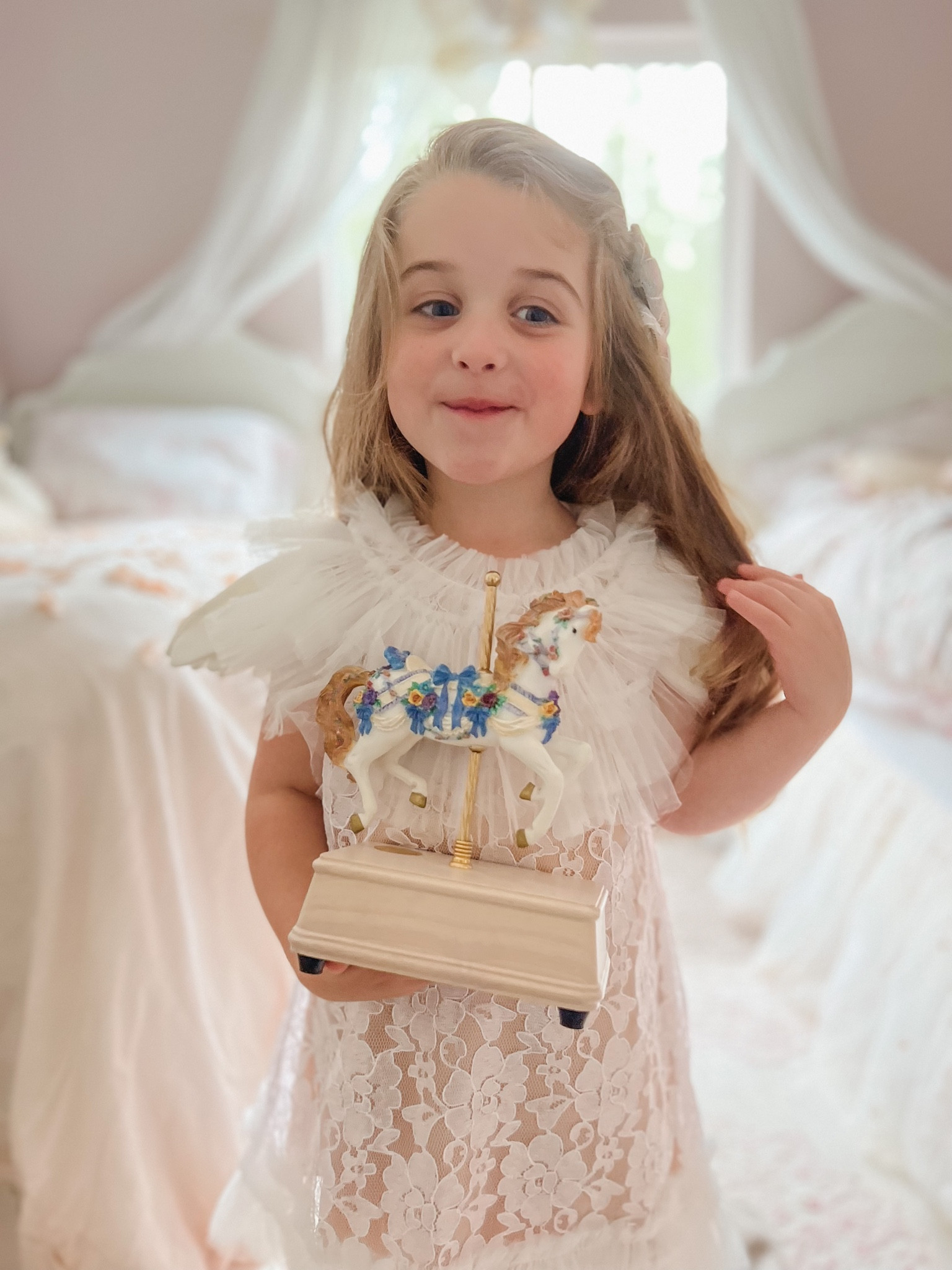Carousel music box and prettiest girls dress

#LTKkids #LTKstyletip