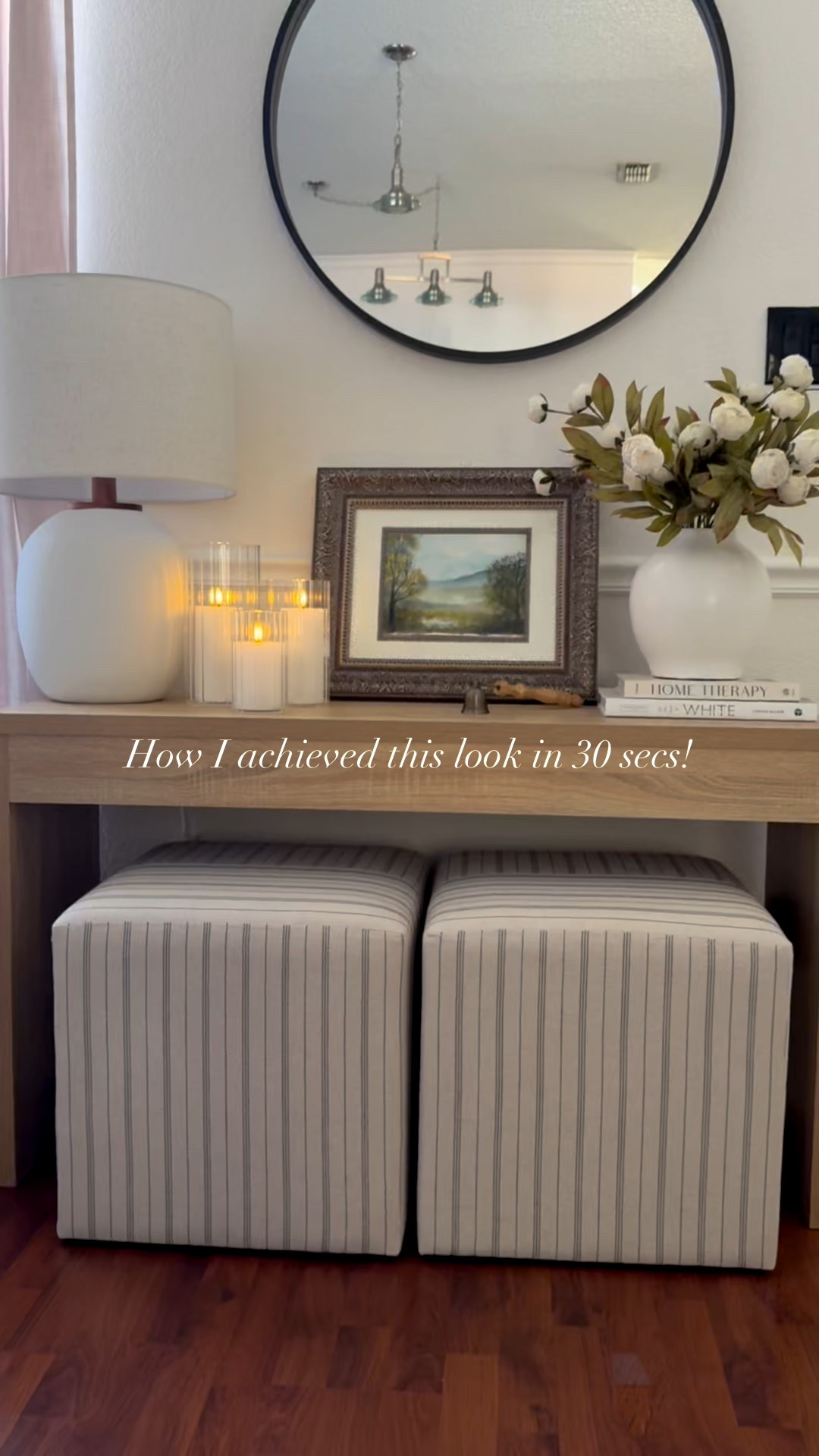 Entry way decor! Console table lamp faux peonies vases hurricane glass vases Flameless candles ottomans

#LTKHome