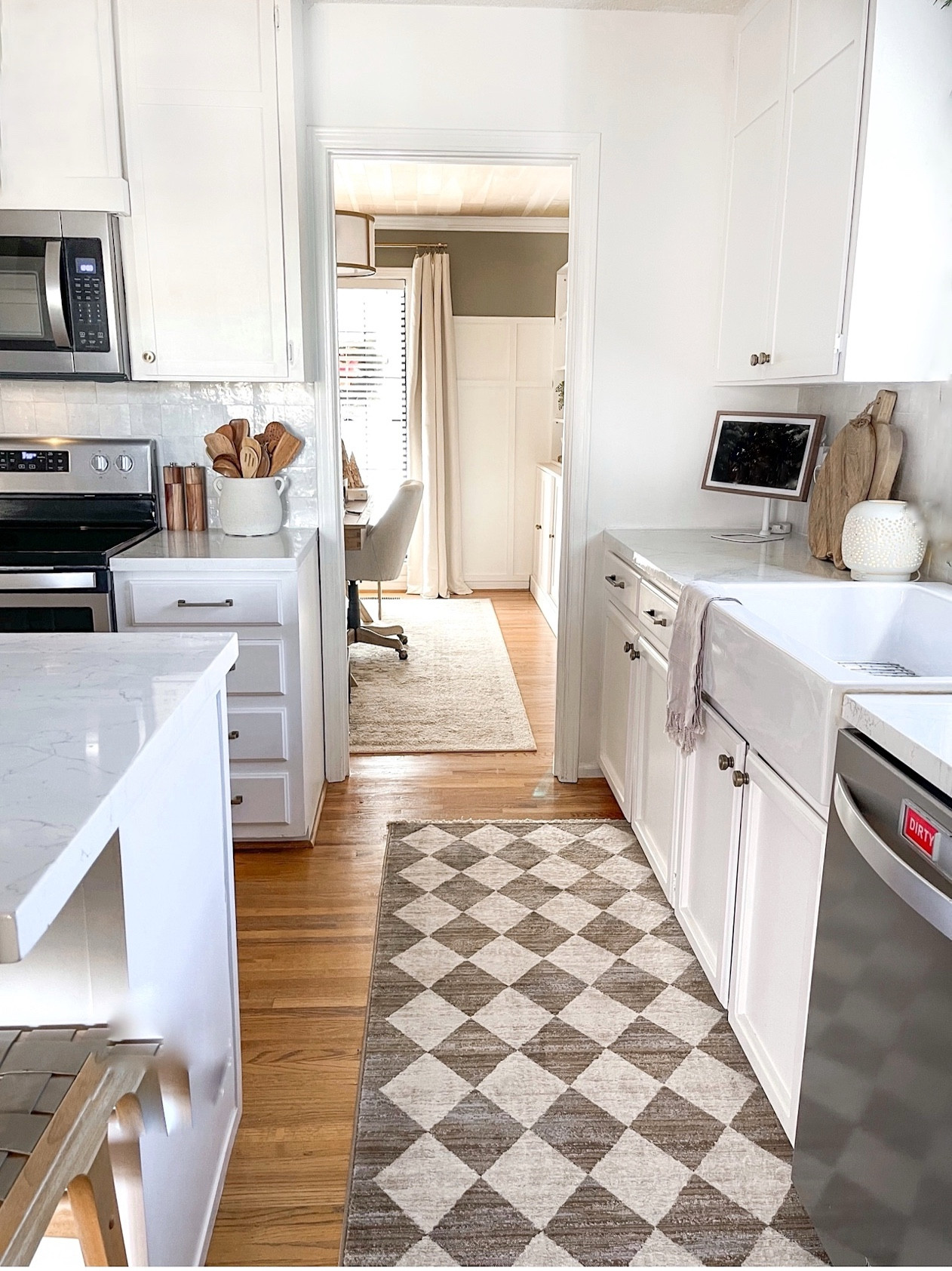My kitchen runner is back in stock.
It is soft underfoot, has the cutest tiny fringe detail on the edges and has a classic pattern and neutral colors.

Mine is the 2’8” x 7’10”, runner 
It comes in multiple sizes.

#LTKstyletip #LTKMostLoved #LTKhome