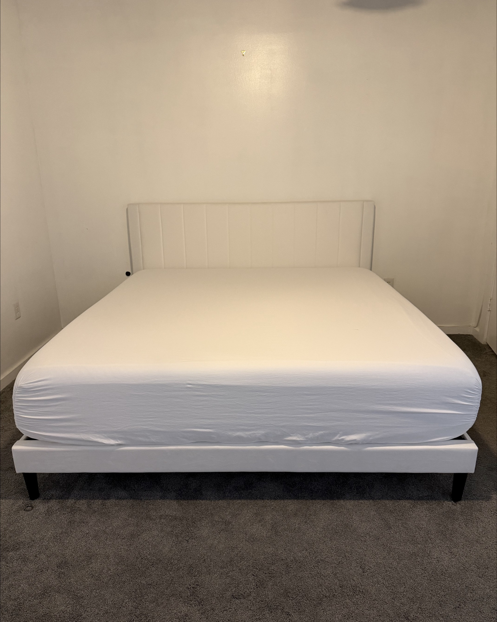 My new king size white velvet bed from Wayfair!
About:
LTK home find for LTK seasonal home refresh and LTK day in my life pics as I move in! 
- platform bed upholstered in soft velvet offers comfort and a clean, modern aesthetic. 
-Subtle vertical channel detailing
 - headboard sits flush with the mattress, keeping pillows and the mattress in place for a cozy night’s sleep. 
- slat-based platform provides direct mattress support
- open space beneath the bed offers convenient cleaning and light storage.

#LTKHome #LTKSeasonal #LTKdayinmylife