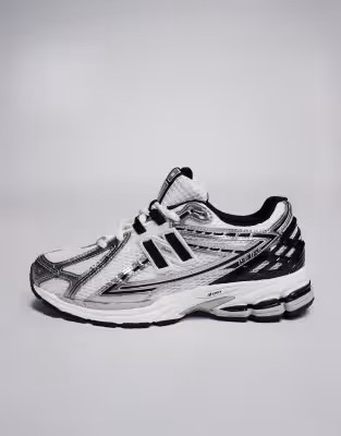 New Balance 1906 sneakers in white with black and silver details | ASOS (Global)