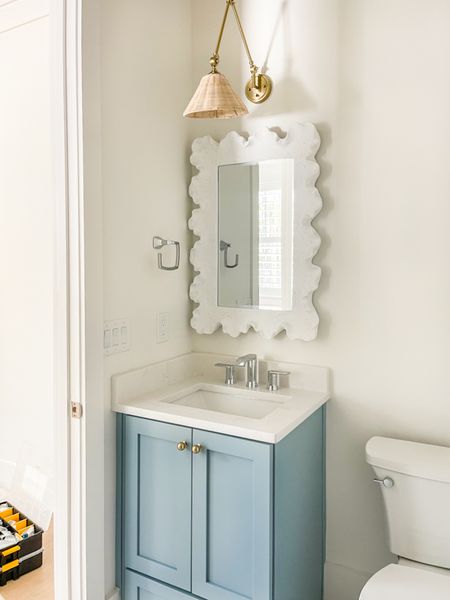 Just hung the mirrors in several bathrooms at our new house! Since I blew the lighting budget on some of the main chandeliers, I had to look for some chic affordable options for other spaces like this guest bathroom. I’m loving the sconces I found for two of the bathrooms (I’ll link them both). We have can lights in the room too, so this is more than enough light. The shade is the perfect neutral (not too yellow or orange) and this coral style mirror has been a long-time favorite. Also linking my favorite brass cabinet hardware knobs and the scalloped hand towel I plan to use in the space.
.
#ltkhome #ltkunder100 #ltkunder50 #ltkstyletip #ltkover40 #ltkseasonal #ltkkids #ltkfamily #ltksalealert

#LTKSeasonal #LTKsalealert #LTKhome
