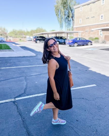 Black dress with lilac sneakers and a faux leather tote. 

#LTKfindsunder50 #LTKmidsize #LTKfindsunder100