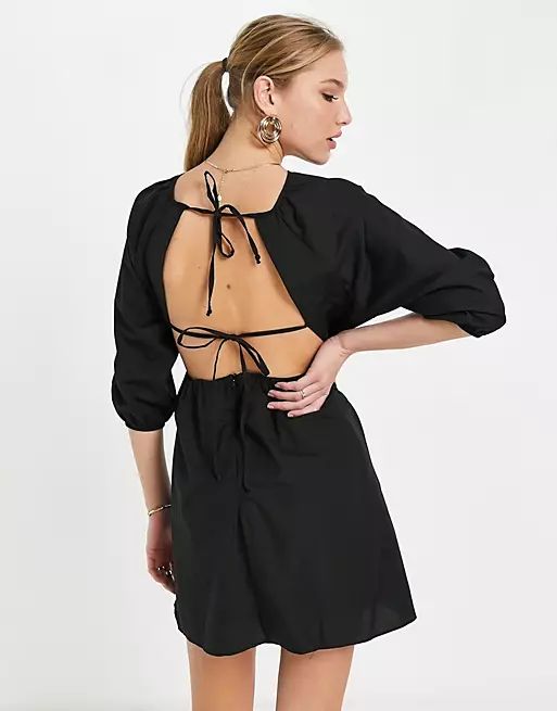 Trendyol mini dress with cutout back detail in black | ASOS (Global)