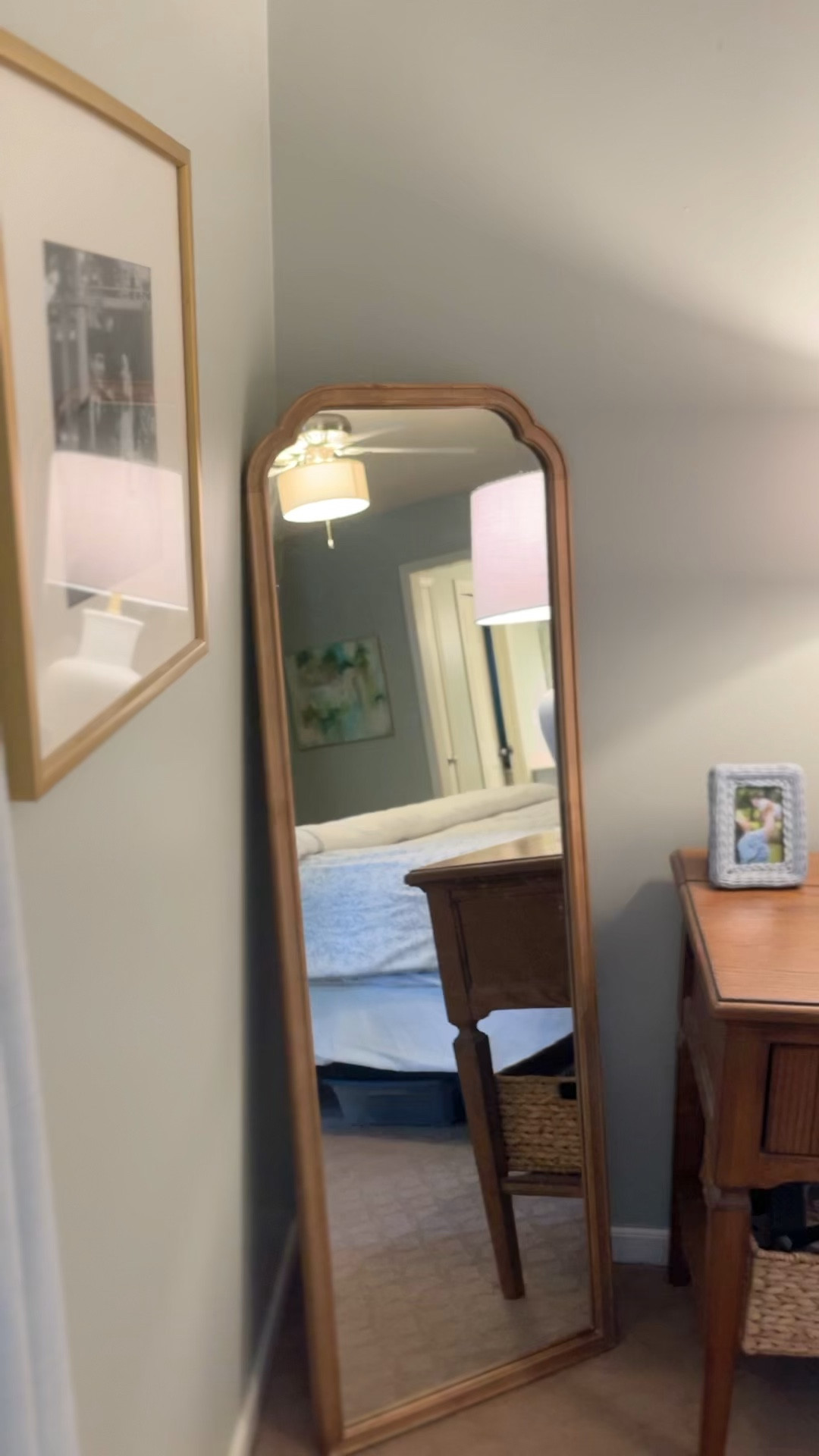 I’ve owned this mirror for a few years, and it’s been great. It has an easel back so you can adjust it or lean it against the wall, like I do. The wood tone adds a touch of warmth to you room. I have the skinnier one, but there is also a larger one they make that works if you have more space!

#LTKhome