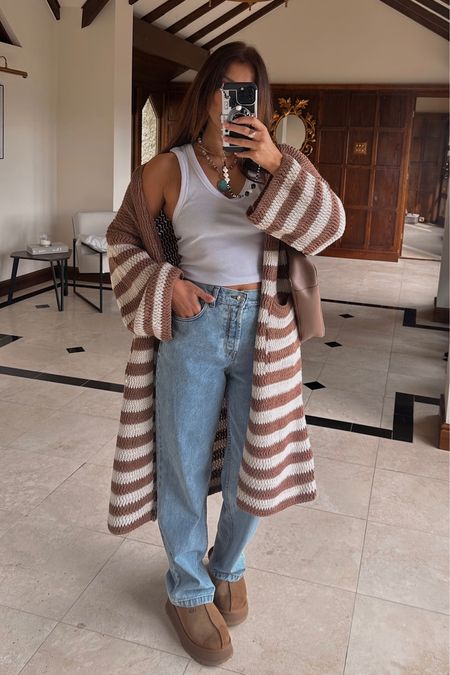 Oversized cardigan in camel stripe is from www.lemonmilklondon.co.uk 
White tank top is asos
Straight leg jeans asos
Ugg platform Tazz 
Fall outfits
Autumn outfit inspo 2023 