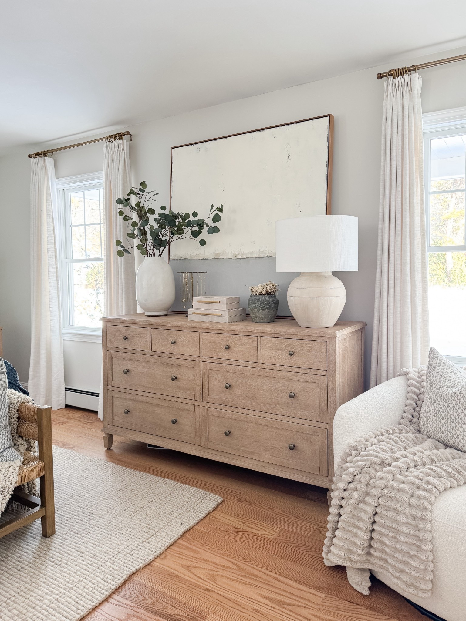 Light wood furniture styled with ceramics and greenery brings warmth and balance to the bedroom. coastal bedroom furniture, wood dresser styling, neutral home decor, coastal interiors, bedroom styling ideas, timeless bedroom, natural textures, home inspiration, sherricalnanhome

#LTKHome