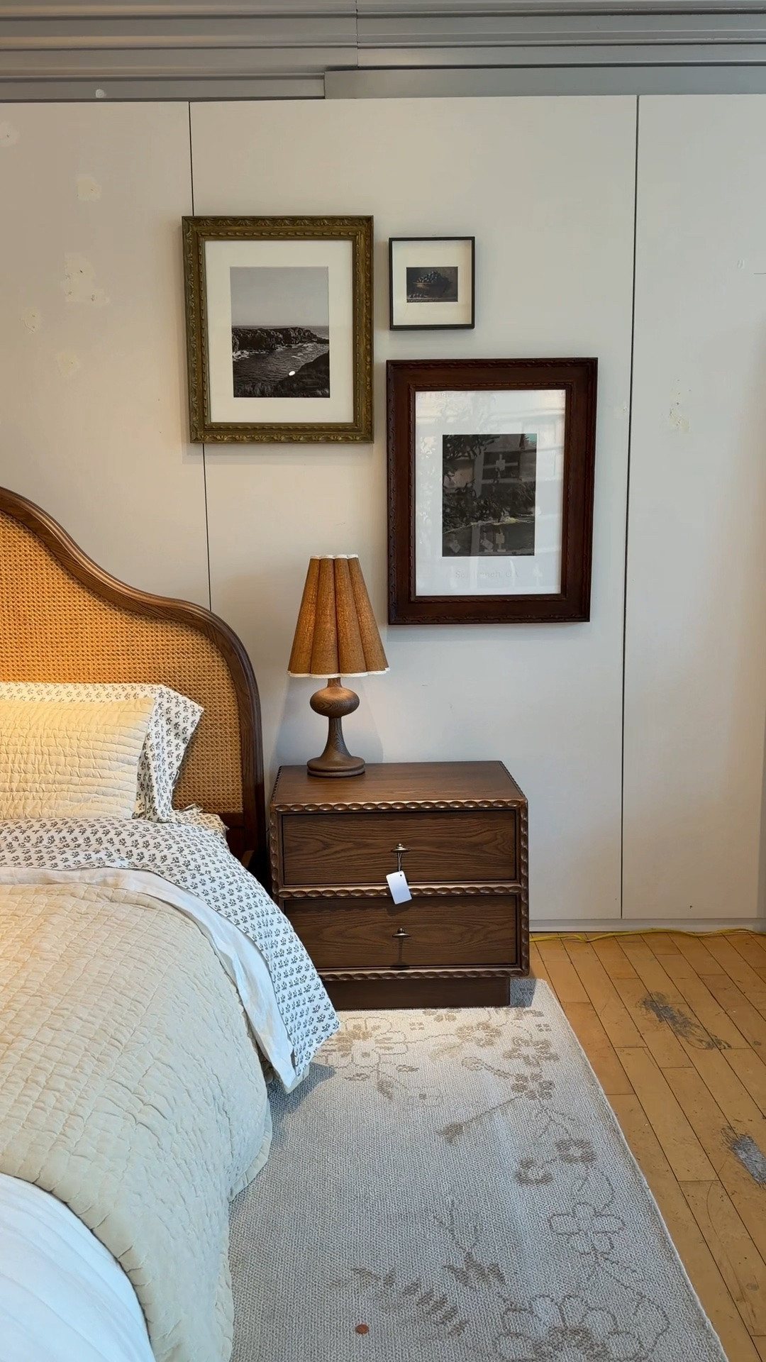 Bedroom details I’m loving lately! 🤎✨ The new Witney Nightstand from Crate & Barrel has the prettiest trim detailing and a rich wood finish that brings so much warmth and character to the space. 😍 Paired with a vintage-inspired bedside lamp and a layered gallery of frames, the whole setup feels charming, collected, and beautifully styled!💫 @Crate & Barrel  #nightstand #homedecor #bedsidetable

#LTKHome #LTKSaleAlert