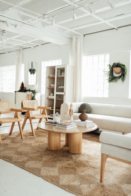 Living room Christmas decor - rug, coffee table, chairs, sofa, wreath

#LTKHoliday #LTKSeasonal #LTKhome