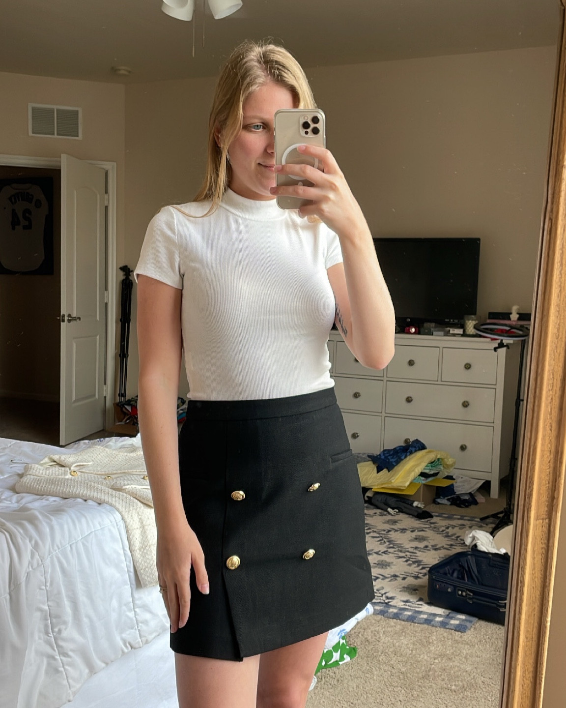 Easy fall outfit. Black & gold button pencil skirt for work. Mock neck ribbed tee. 

#LTKworkwear #LTKSeasonal #LTKunder50