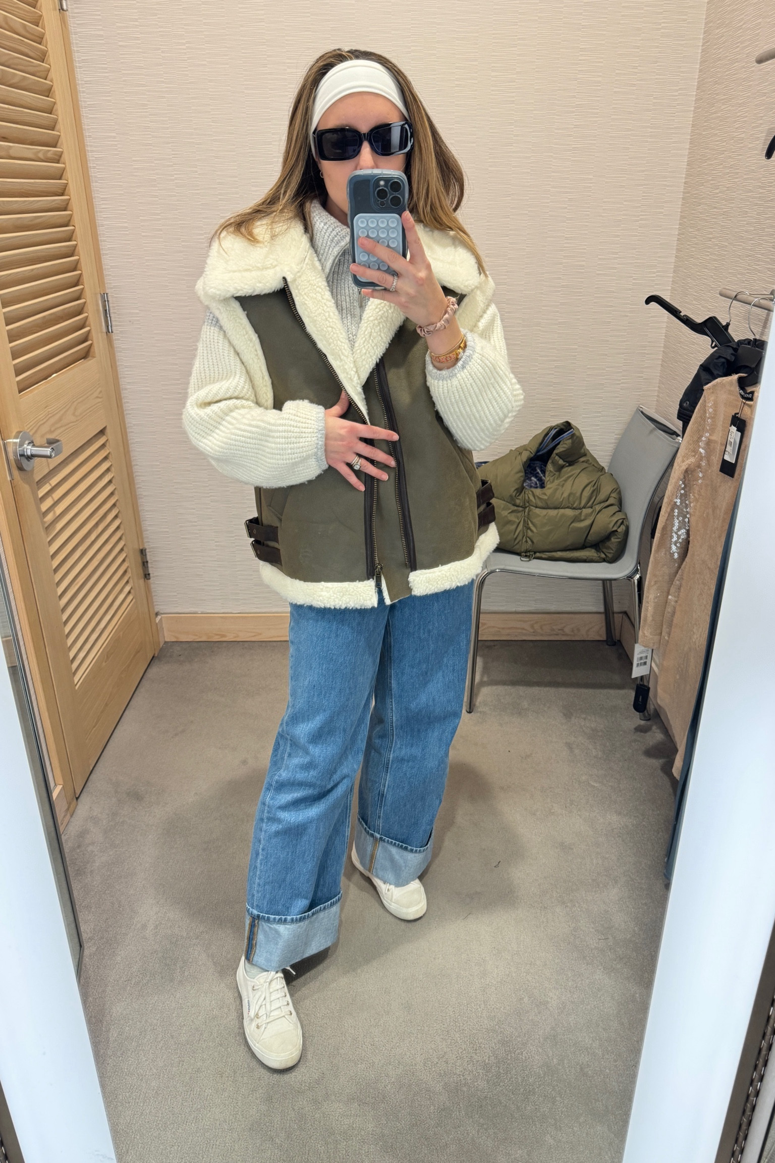 Been eyeing this vest online, seeing her in person was even better!

Faux shearling vest from Apparis
Sweater from Z Supply
Jeans from Frame (seemingly sold out)
Sneaks from Superga 

#LTKfindsunder100 #LTKMostLoved #LTKSeasonal
