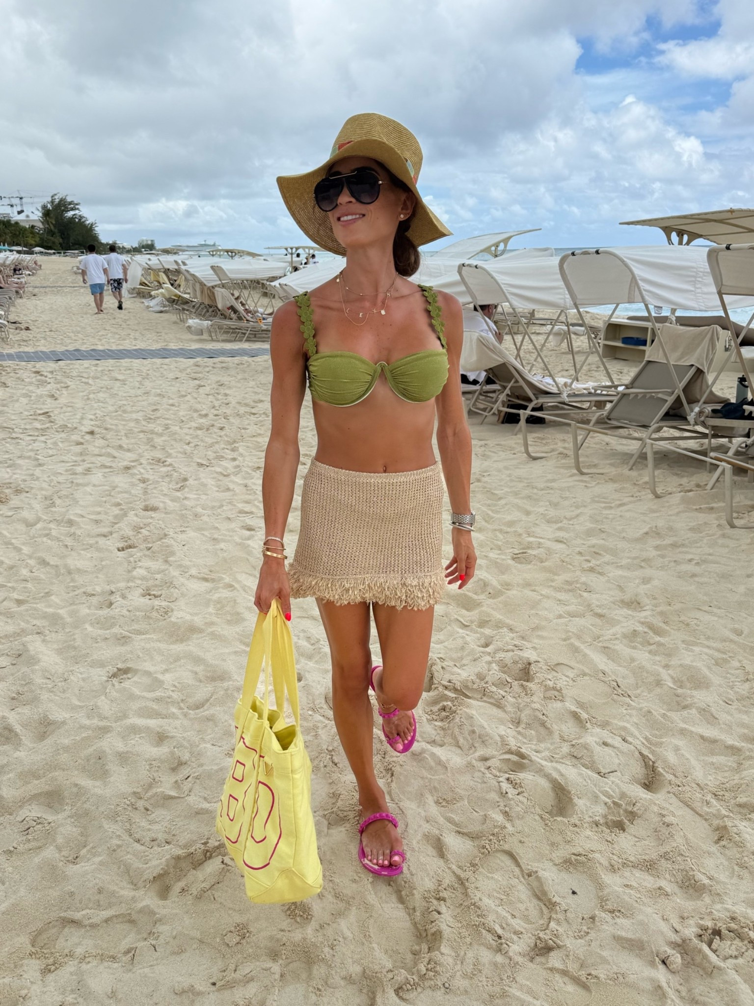 If youre headed to the beach this fringe skirt cover up is so fun. Wearing size s. Green bikini wearing size s top xs bottoms code belbel15

#LTKPetite #LTKSwim #LTKTravel