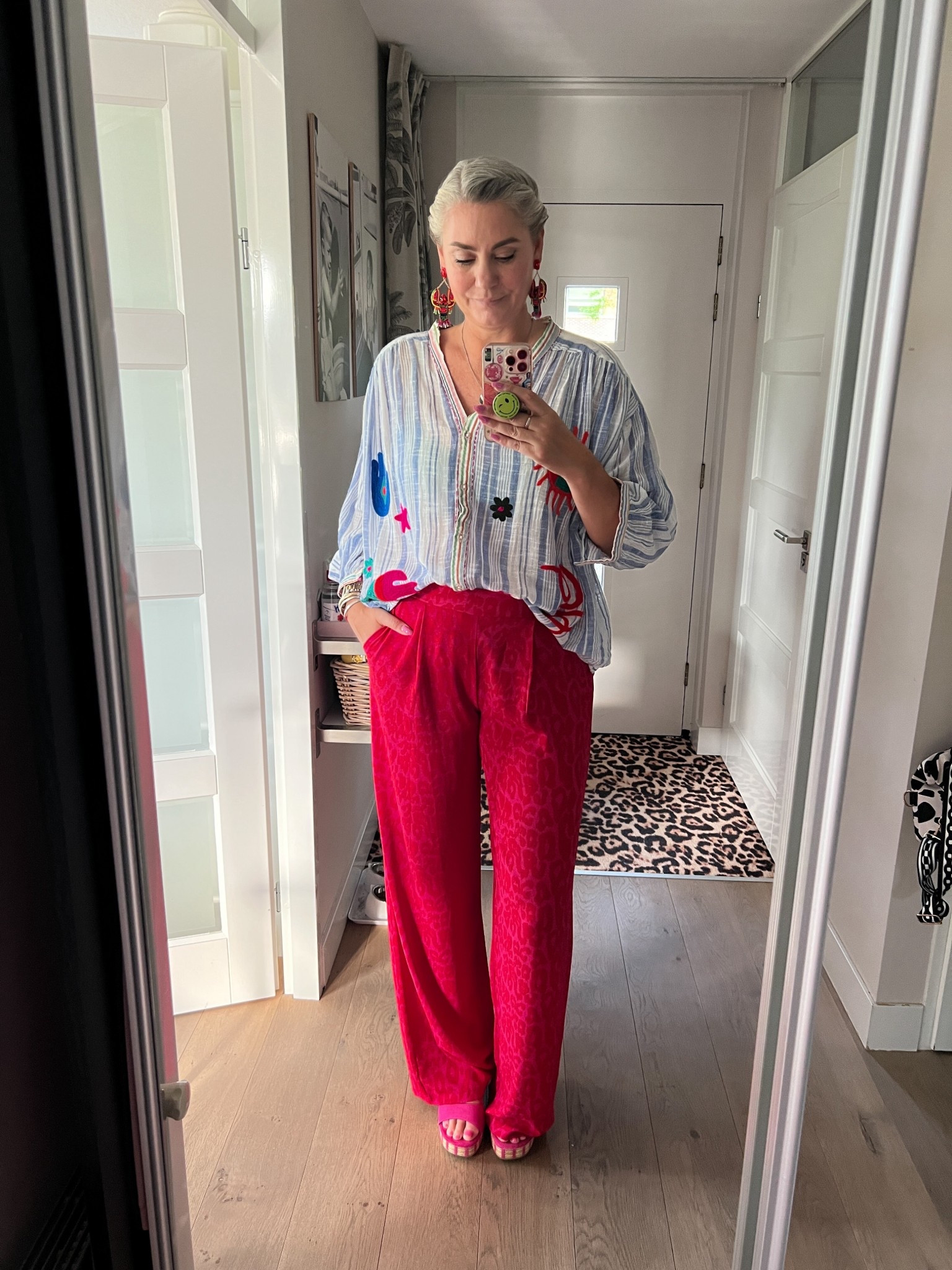 Ootd - Monday. Red and pink leopard wide leg trousers (L, https://most-wanted-nl.mtpc.se/5496156) paired with a blue and white embroidered blouse (local boutique), magenta wedge sandals and lobster 🦞 earrings. 



#LTKsummer #LTKeurope #LTKnederlands