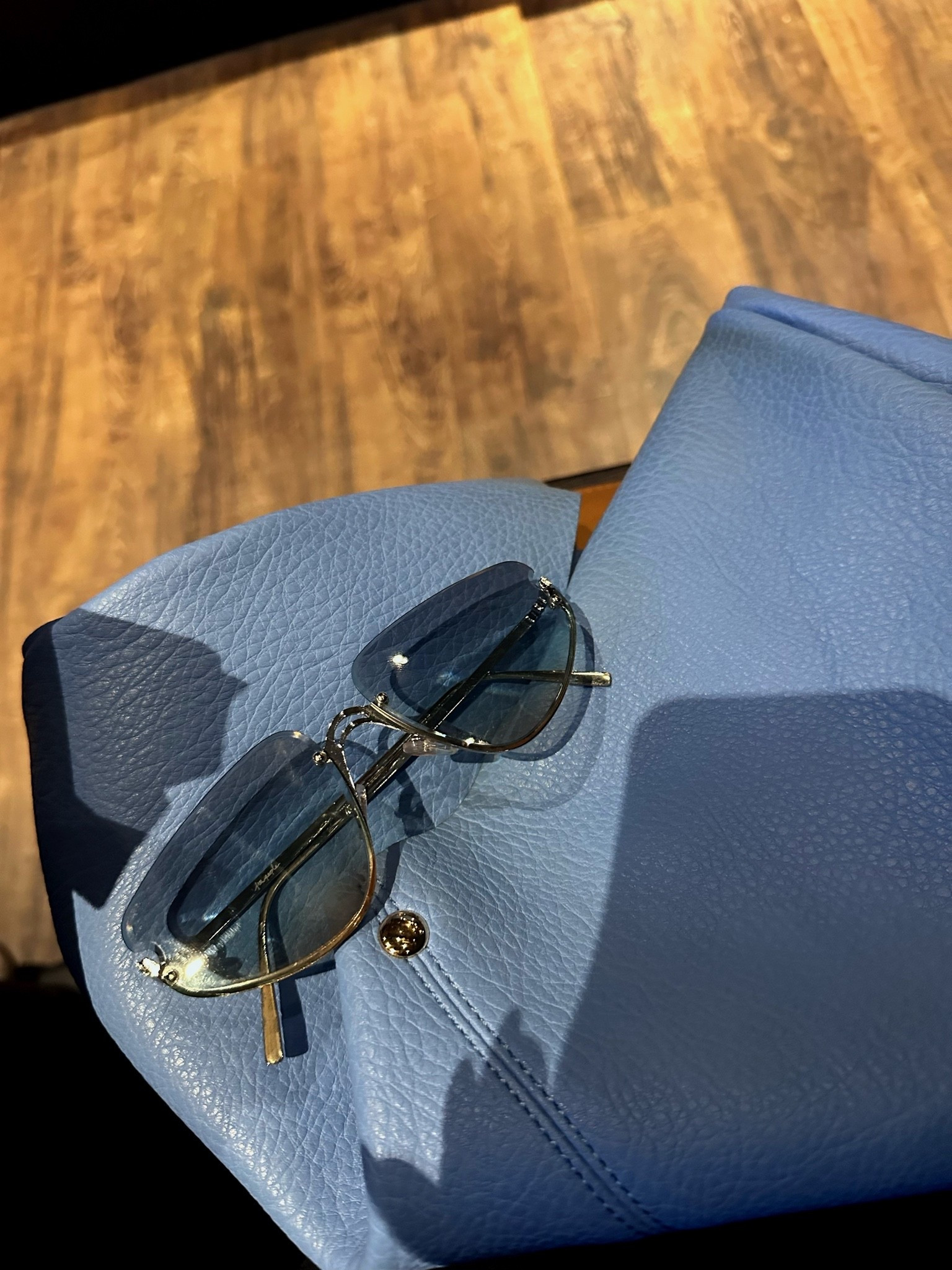 Blue Rimless sunglasses 

Bags come in multiple colors. I purchased it in light blue

#LTKootd #LTKgrwm #LTKvlog