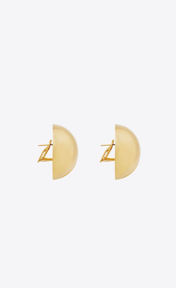 Pair of clip-on oversized half-dome earrings with a vertical split at the center. | Saint Laurent Inc. (Global)