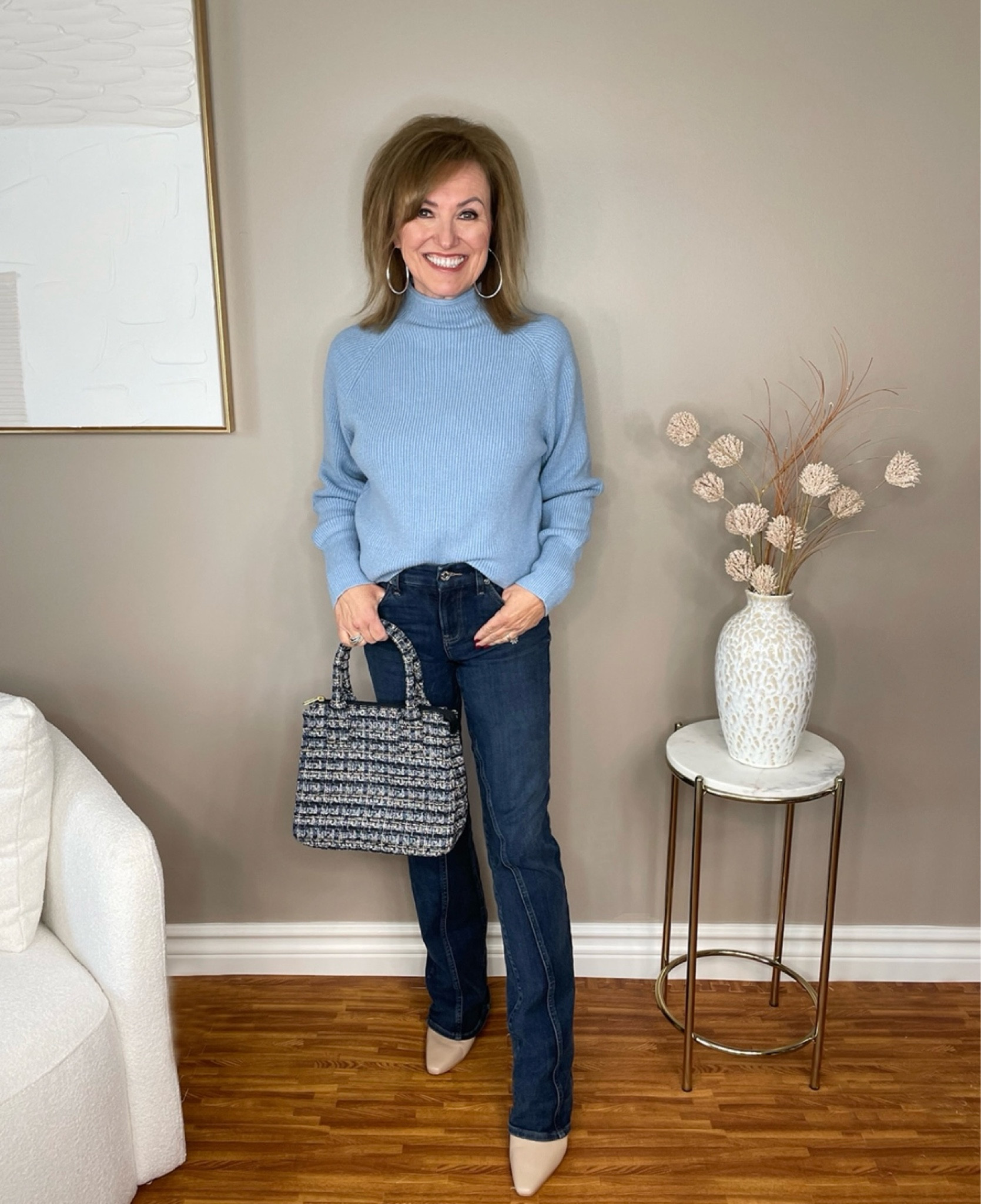 And here is my funnel neck sweater from my video. If you’re wondering what a funnel neck is, it’s described as “a high neckline that is wider at the top than the bottom. It is cut or knit into the torso in one piece, rather than being an added collar.” 

I love that it’s little more unstructured than a turtleneck or mock neck, but on the flip side, a little more structured than a cowl neck! 

#LTKOver40 #LTKSeasonal #LTKStyleTip