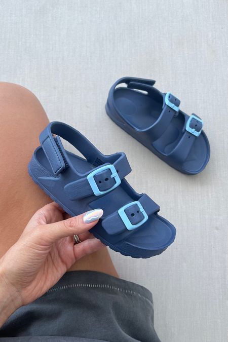 Ollie’s blue sandals - so comfy & easy for him to put on and under $10 🙌🏼

Toddler sandals, little boy sandals, boy sandals, kids sandals, blue kids sandals, boys sandals, Walmart, Christine Andrew 

#LTKkids #LTKshoecrush #LTKswim