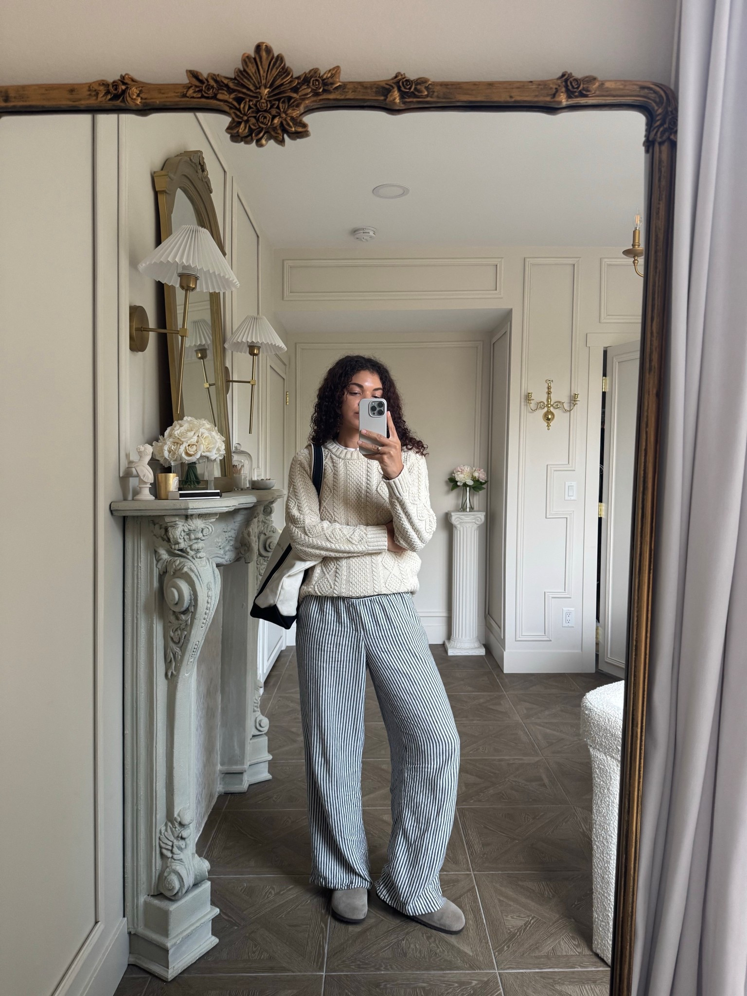 Casual spring outfit: striped pull on pants, clogs, boat tote, cable knit sweater 

#LTKootd