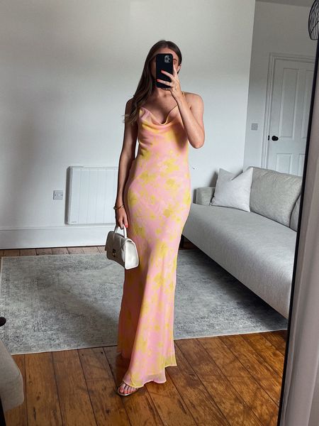 Summer occasion wear/ wedding guest inspiration 
Wearing a size 8 in the Topshop pink and yellow print maxi slip dress 
Russel and Bromley cream bag (old so have linked similar) 

