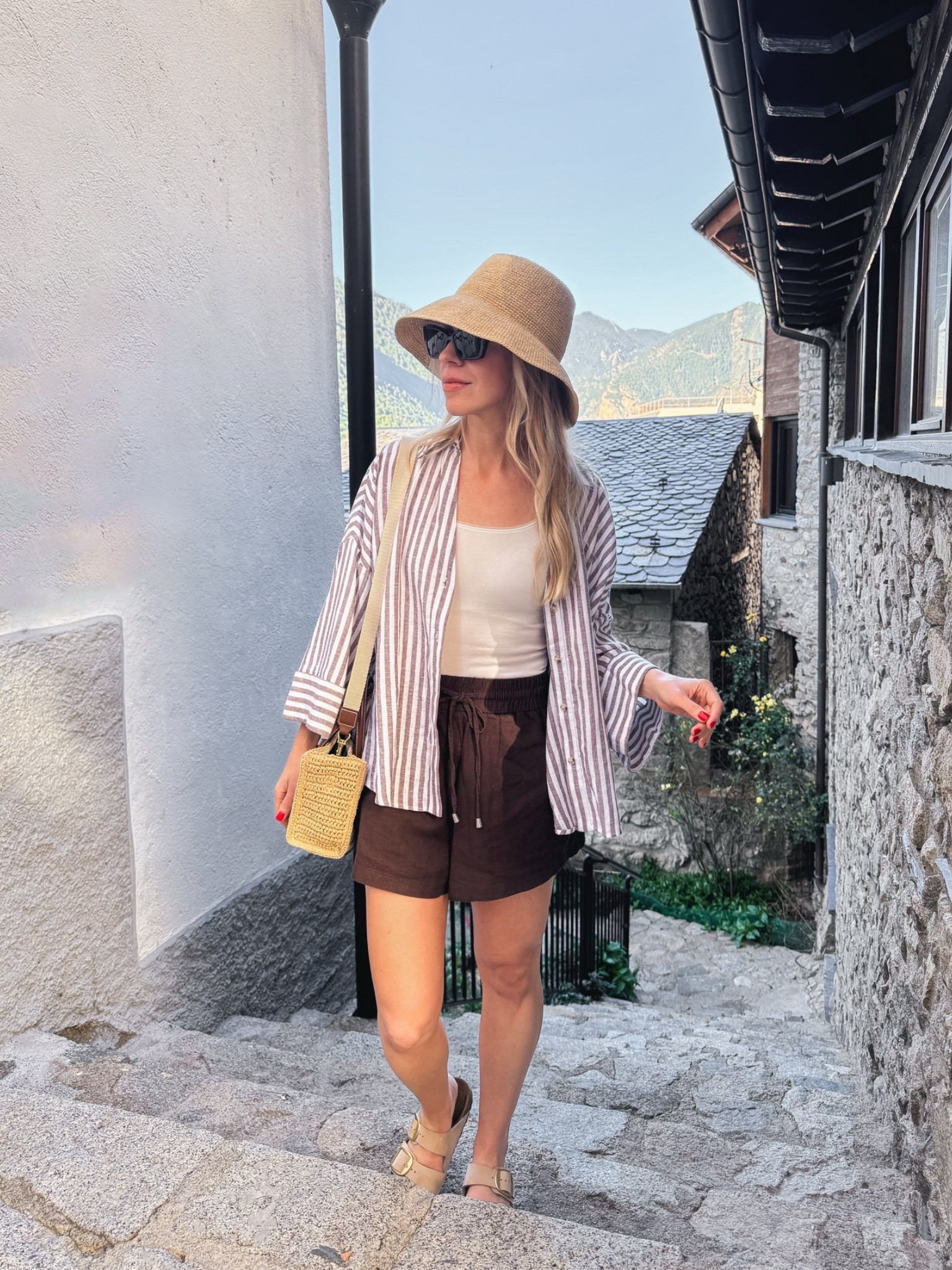 Euro summer, summer vacation, travel look, striped linen shirt, @Janessa Leone straw bucket hat

#LTKTravel #LTKSeasonal #LTKSaleAlert