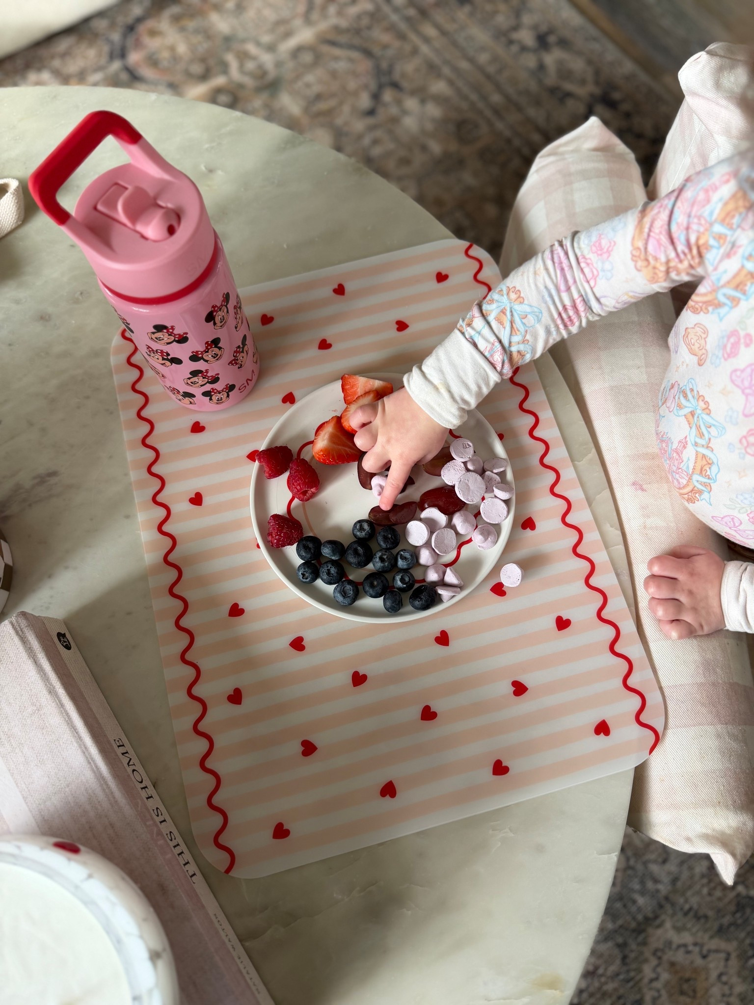 Cutest striped and heart placemat and plate set for Evie ❤️💘 these are so nice to have!!! 

#LTKValentine #LTKmomlife #LTKKids