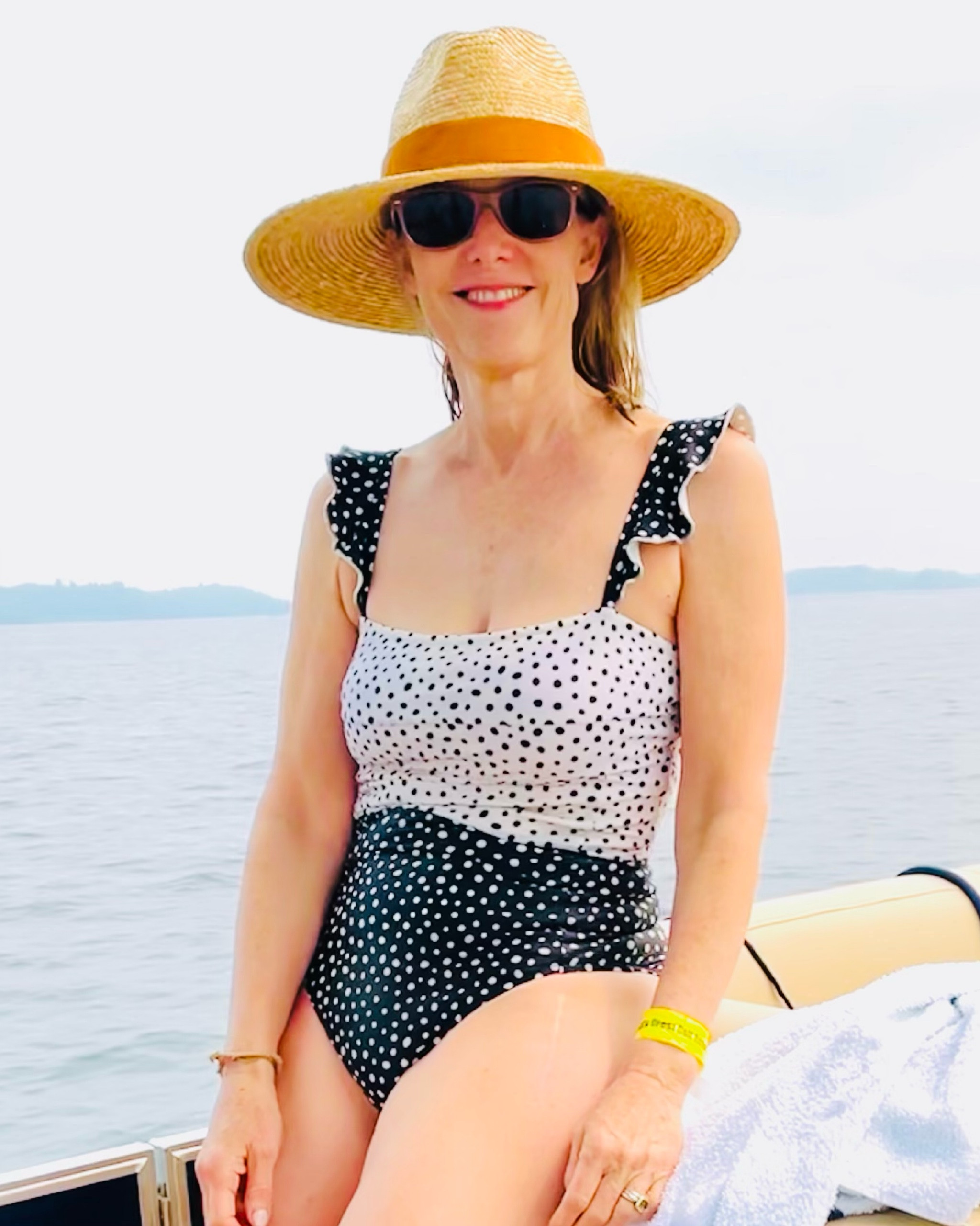 One of my favorite Summersalt swimsuits is 50% off! 💦It’s the Ruffle Oasis and I’m in the color “On the Dot”. Available in 5 other colors (black is shown below) in sizes 2-22! Sale is sitewide. They offer long-torso suits as well. 💕 
My hat is the Isla Fedora by Gigi Pip. Fantastic quality. 

#LTKover40 #LTKsalealert #LTKSale