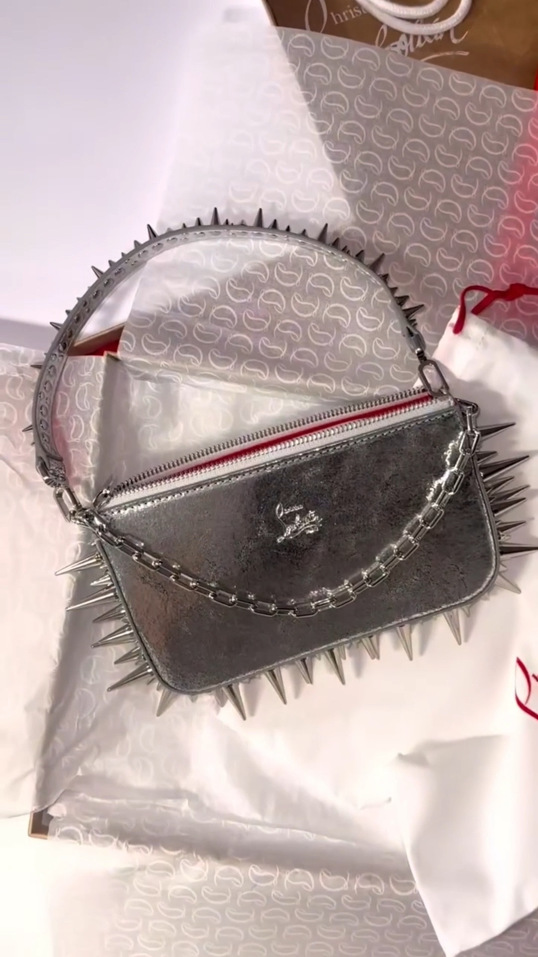 POV: You just unboxed your dream bag 😍✨ 

The @louboutinworld Loubila Mini bag is serving nothing but main character energy, with its sleek silver chain and signature silver spikes…

The details on this beauty are everything! 🤩 Would you rock this stunner? 



#purseporn #designerbags #spikedclothing
#LouboutinLover #LuxuryUnboxing #StatementStyle #louboutinworld #dreambag #maincharacter #fashioninfluencers #fashiondaily #fashioninsta #fashiongram #styleicon #fashiontrends #womensfashion #fashionvideo #fashionreel #styleinspo #ReelTrends #silveraesthetic

#LTKBeauty #LTKgrwm #LTKootd