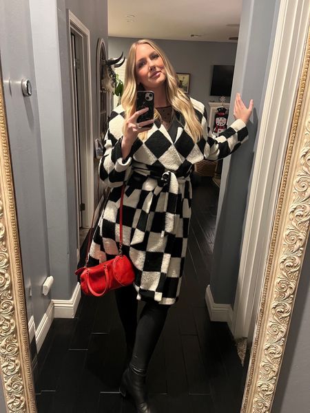 How fun is this black and white checkered coat? I am wearing a size large and it fit perfectly! So soft and cuddly. I paired it with my faux leather black Spanx size 1XL tall, black leather booties by Clarks size 10, and made it festive with a red crossbody purse! Happy Holidays 🎄🎁🎅🏽
xoxo
Ashley 

#southworthdesign

#LTKHoliday #LTKover40 #LTKSeasonal