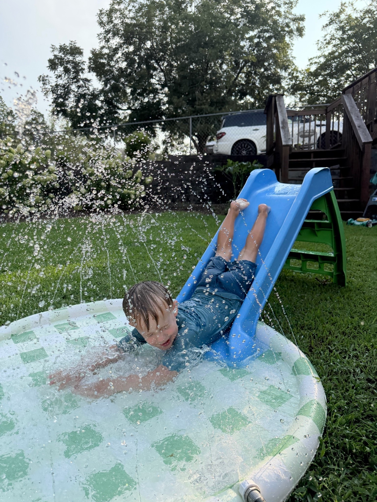 Slide + splash pad = best summer nights!

#LTKmomlife #LTKKids #LTKSwim