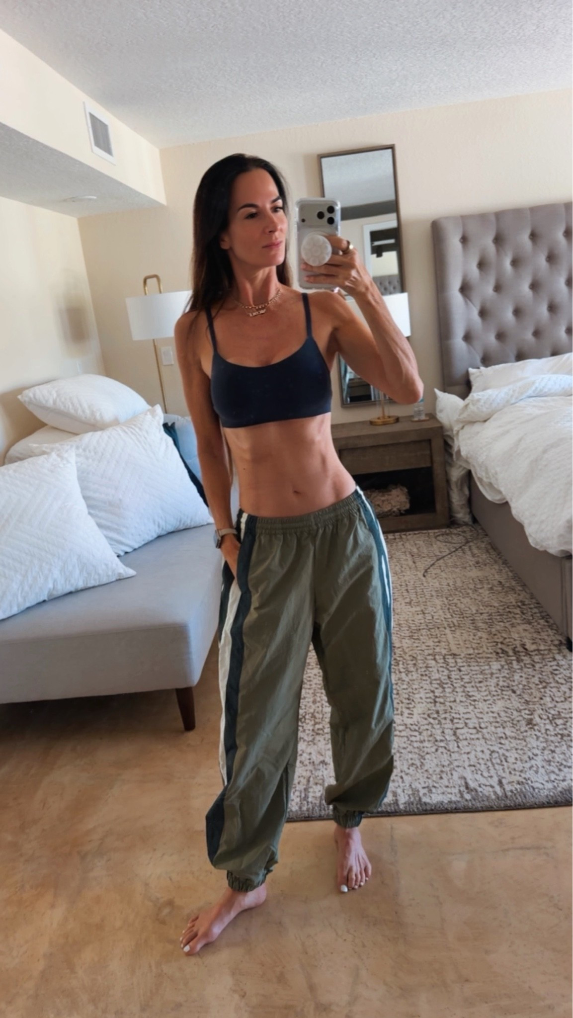 Track pants are having a MAJOR moment and this pair understood the assignment. 💚🔥

The color blocking, the relaxed fit, the sporty little attitude…I’m obsessed. Comfy enough for running around, but cute enough to make the entire outfit feel intentional. Just add a fitted tank, sneakers and a little confidence. 😉

Are we officially bringing track pants into fall? Because I’m already there.

Wearing XS. 

#TrackPants #SportyChic #FallStyle #CasualChic #NicoleColeeStyle

#LTKdayinmylife #LTKgrwm #LTKootd