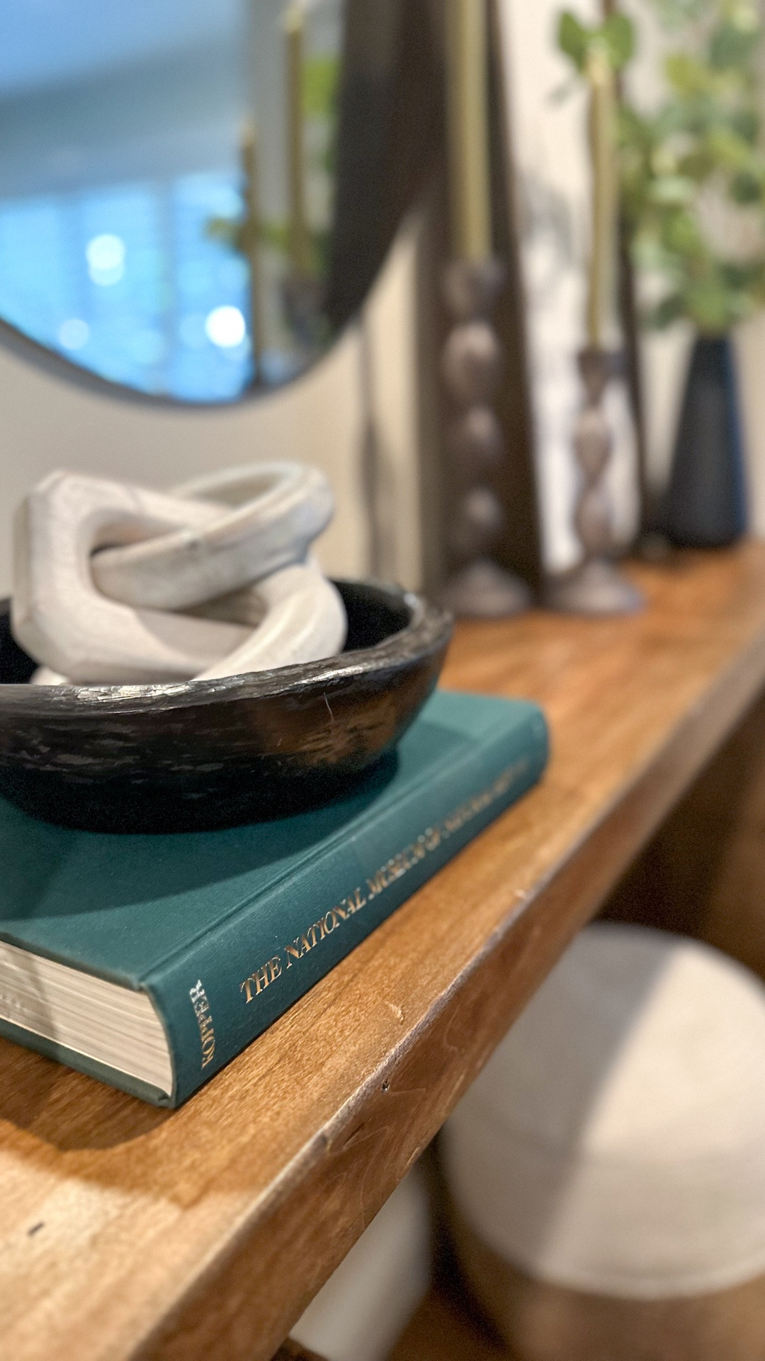 An easy formula for a well-styled console.

Start with a backdrop, like a mirror, artwork, or gallery frames. Add layers by stacking smaller items together, then vary the heights across the table with a lamp, candle holders, or pottery.

Bring in a botanical for a little life and texture. Then, if space allows, add a basket or ottoman underneath for extra storage and function.

Simple, balanced, and easy to recreate.

#LTKHome