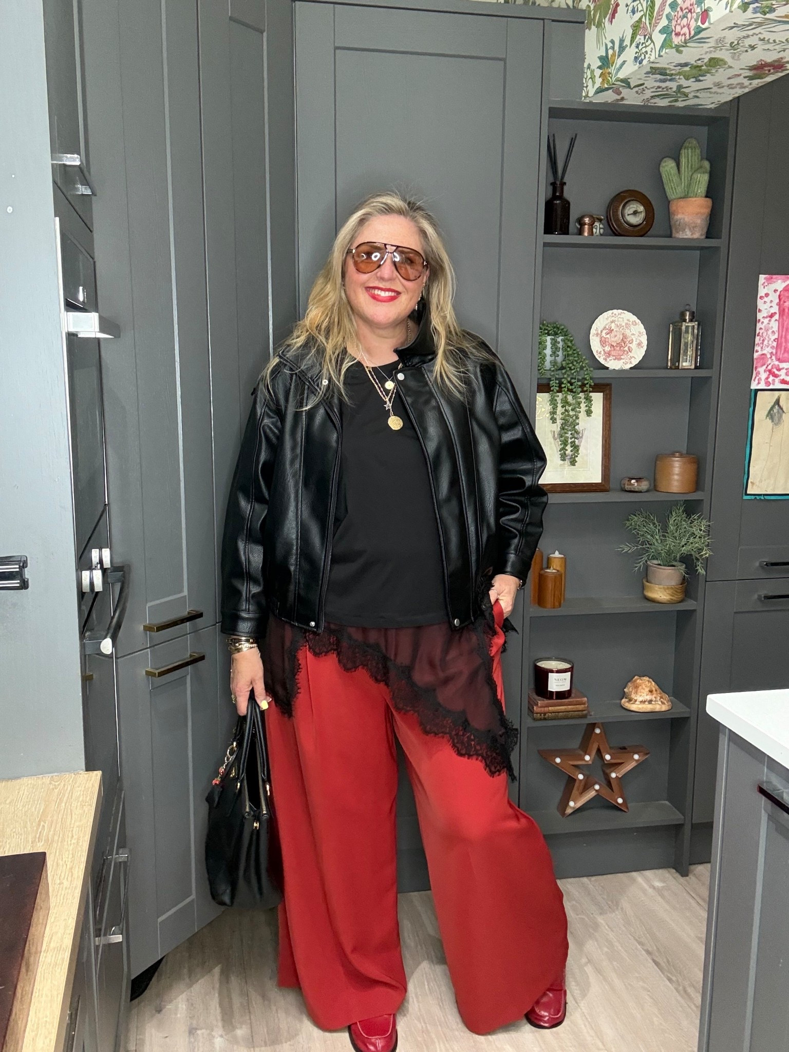Red trousers, black lace tshirt, black jacket, black tote bag, red loafers, sunglasses 

#LTKspring #LTKdatenight #LTKplussize