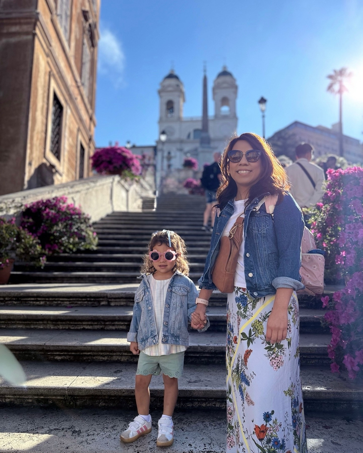 Catching up on our first full day exploring Rome. This was a few weeks ago, but I’ve been slowly going through all the photos and wanted to share some of our favorite moments.

We started at the Spanish Steps, made our way to the Mouth of Truth (after realizing we were at the wrong statue at first), and then walked over to the Aventine Keyhole. The line was way too long, so we skipped it, but we did see the doors from a distance. Right by there, we stopped at the Giardino degli Aranci, where you get that beautiful view of St. Peter’s Basilica in the distance.

Later, we explored Piazza Navona, and then on our way back to the Airbnb before JeLisa and Bill arrived, we saw a long line of people waiting to see Pope Francis being carried to the church where he wished to be buried. We didn’t stay or wait, but we knew what was happening and that he was about to pass by.

Once JeLisa and Bill got in that afternoon, we all went to grab some pizza and pasta, then made our way to the Villa Borghese Gardens.

There was a lot of walking. A lot of stairs. And since the airline lost our stroller, we were carrying the kids on our backs the whole time.

It was a long day, but such a good one. More little recaps coming soon.

#RomeRecap #FirstDayInRome #FamilyTravel #RomeWithKids #TravelWithKids #WanderingRome #WhenInRome #ItalyWithKids #PiazzaNavona #SpanishSteps #VillaBorghese #TravelDiaries #OurTravelStory #PostcardFromRome #PopeFrancis #EuropeWithKids #FamilyAdventure #MomLifeAbroad #RomanHoliday #RomeTrip