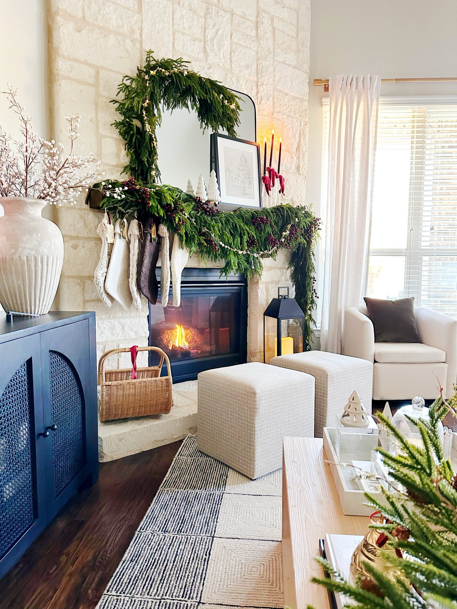 this year‘s holiday mantle might be my favorite. I love the added touches of cranberry colors and berry stems mixed with different neutral-colored stockings in yarn and boucle. 

#LTKHoliday #LTKStyleTip #LTKHome