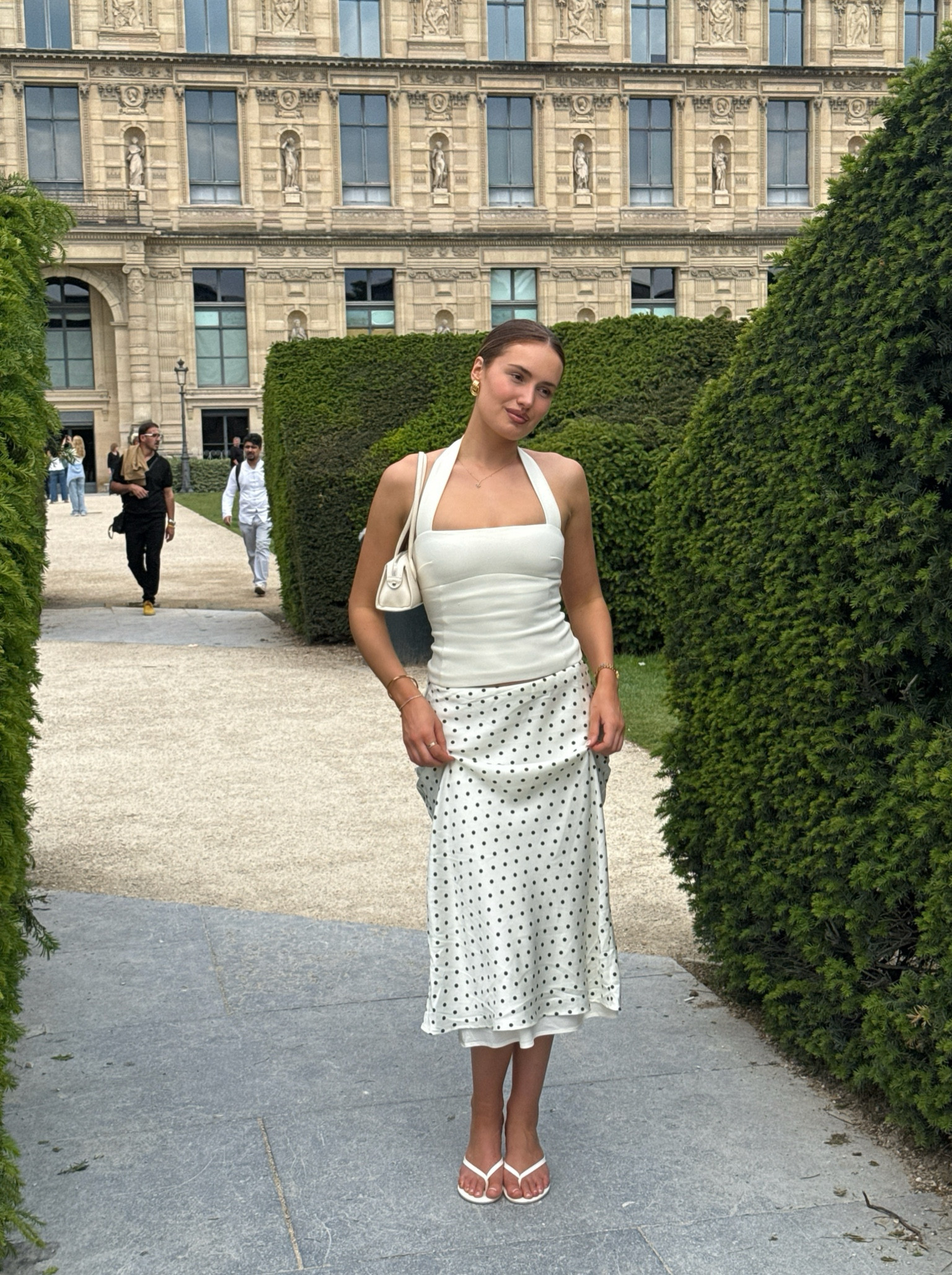 Paris outfit, Paris outfit inspo, polka dot skirt, polka dots, meshki top, revolve skirt, white kitten heels, white bag 

#LTKeurope #LTKuk #LTKspring