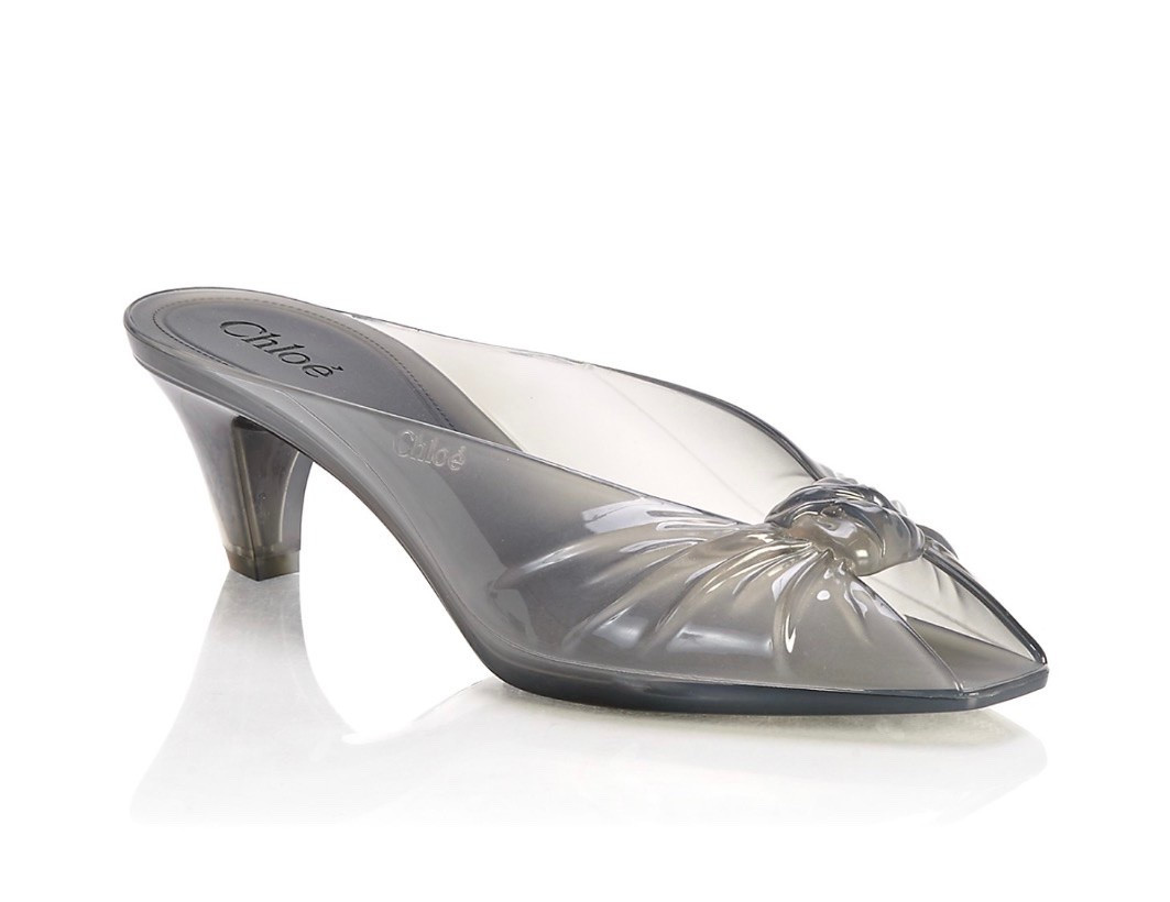 Chloe Women's Jelly Mule Sandals

The Chloé jelly mules are crafted from transparent TPU. Set on a curved kitten heel, they feature a peep-toe with gathered knot design and an embossed Chloé logo.

#LTKootd #LTKWorkwear #LTKTravel