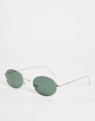 ASOS DESIGN metal oval sunglasses with G15 lens in gold | ASOS (Global)