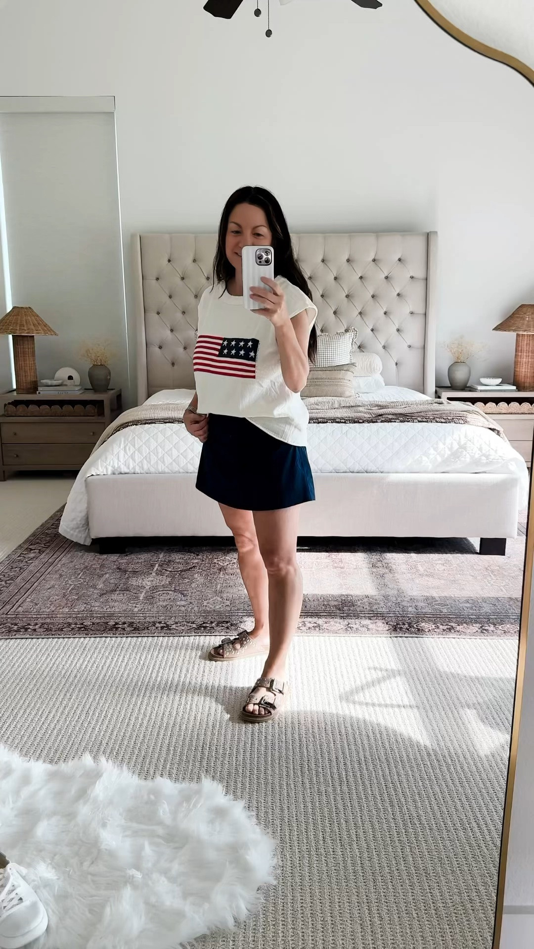 Memorial Day outfit ideas are trending and this is such an easy everyday look for summer 🇺🇸 This patriotic sweater tank paired with a navy skort and neutral sandals works for Memorial Day weekend, casual summer outings, backyard BBQs, travel days, and everyday wear. Comfortable pieces you can mix and match all season long. Follow me on LTK for daily fashion, home decor & Amazon finds.

#LTKootd #LTKvlog #LTKmomlife